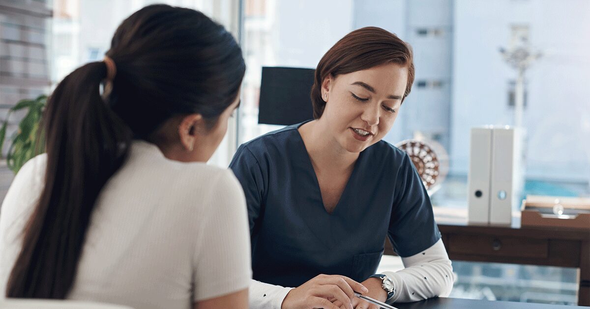 Healthcare professional discussing the signs of an incomplete abortion and when to seek medical care.