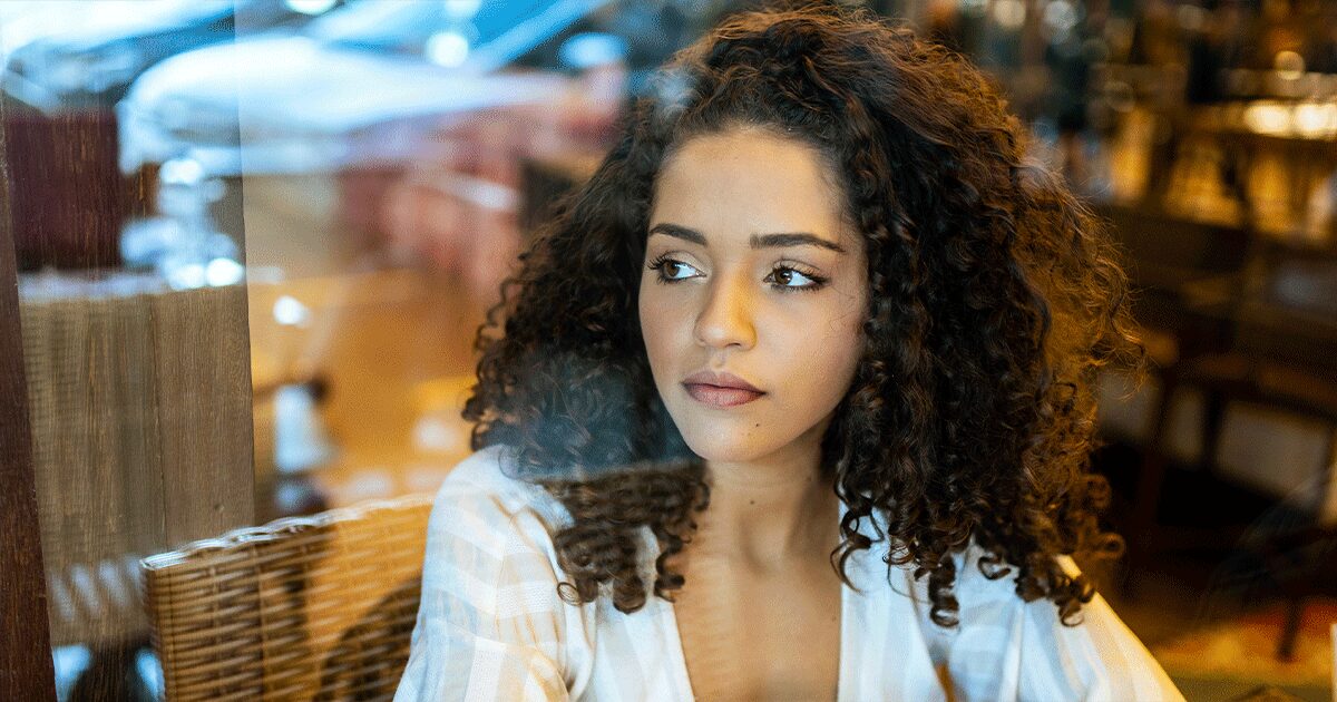 Woman reflecting on her emotions and seeking healing after an abortion.